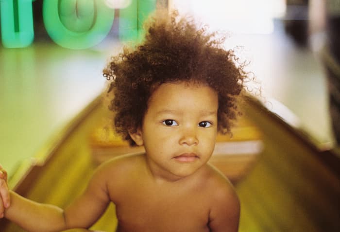 Make sure to moisturize that gorgeous hair, and use a satin pillowcase to reduce tangles during the night.