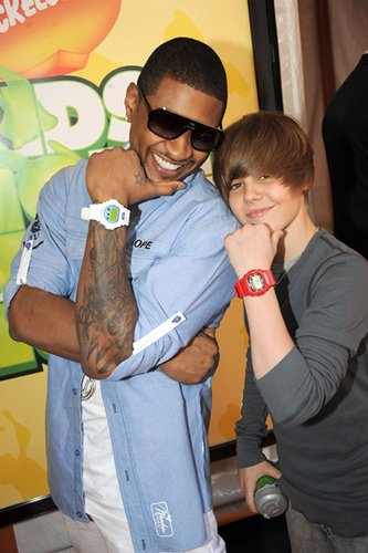 Usher and Justin Bieber pose with their G-Shocks.