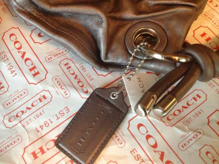 Lone Coach embossed leather hangtag. REAL