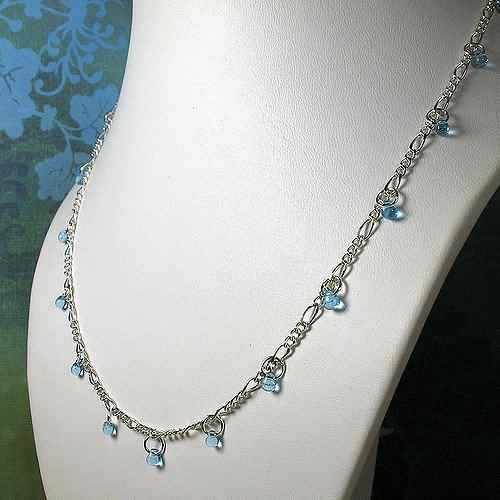 Embellished Figaro necklace chain.