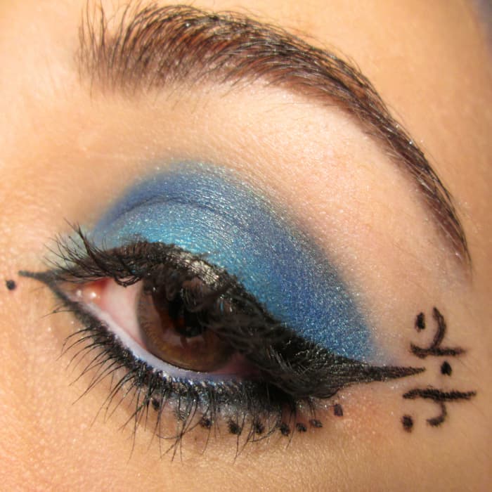 Liquid eyeliner is best when drawing tiny details around your makeup.
