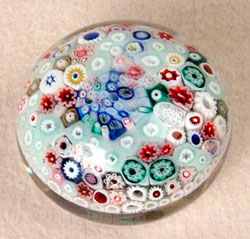 A rare, antique baccus concentric millefiori paperweight sold at auction for $4200 US. 