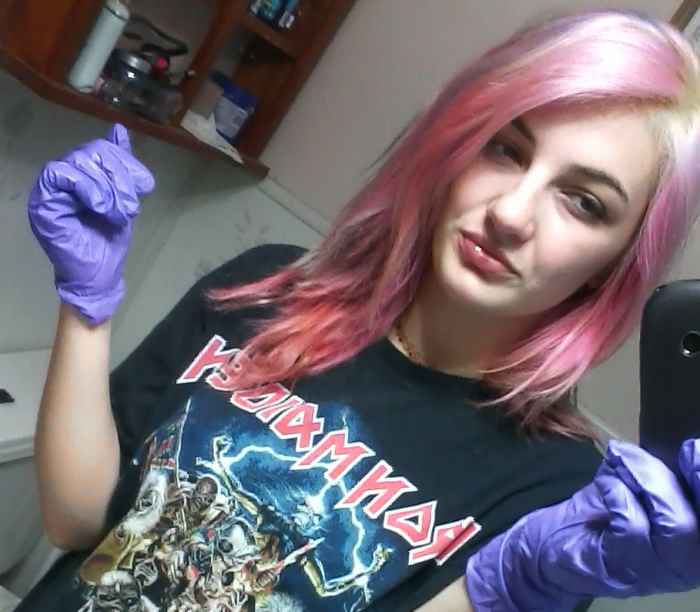 My hair faded to pink weeks after an application of Manic Panic's Shocking Blue.