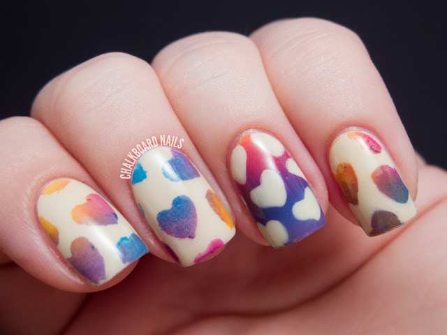 Nails with a gradient design on top.