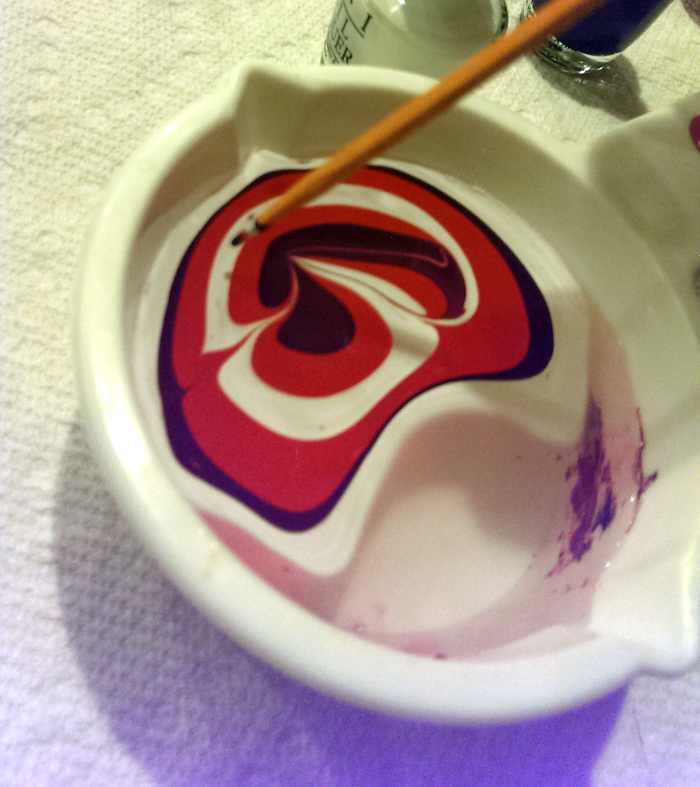 Colors swirled together with a toothpick.