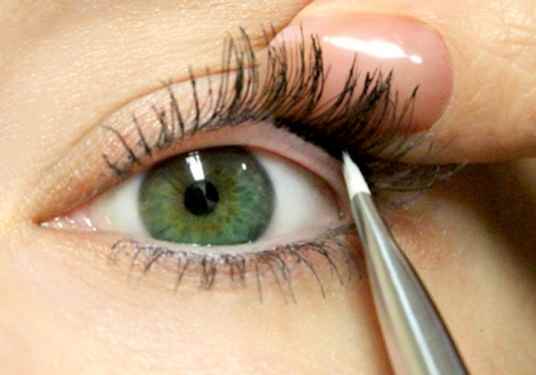 Line your inner eyelid rims with a waterproof eye liner pencil or a gel eye liner and brush.