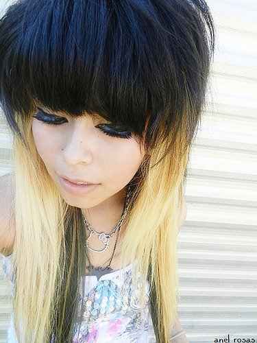 Black hair on top of the head with blonde on the bottom.