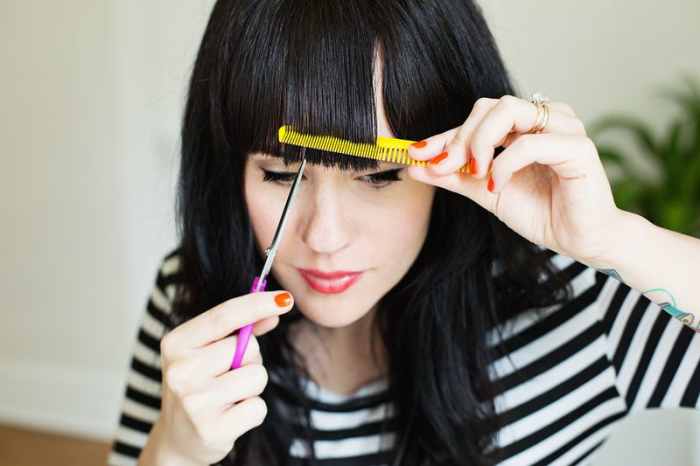 Especially for bang trims, ALWAYS hold the scissors vertically, not horizontally.
