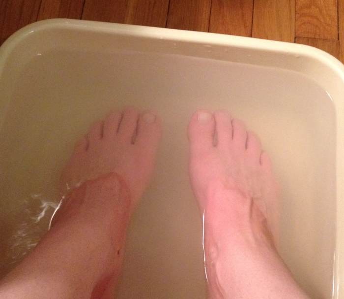 Washing and soaking your feet helps prepare them for the peel.