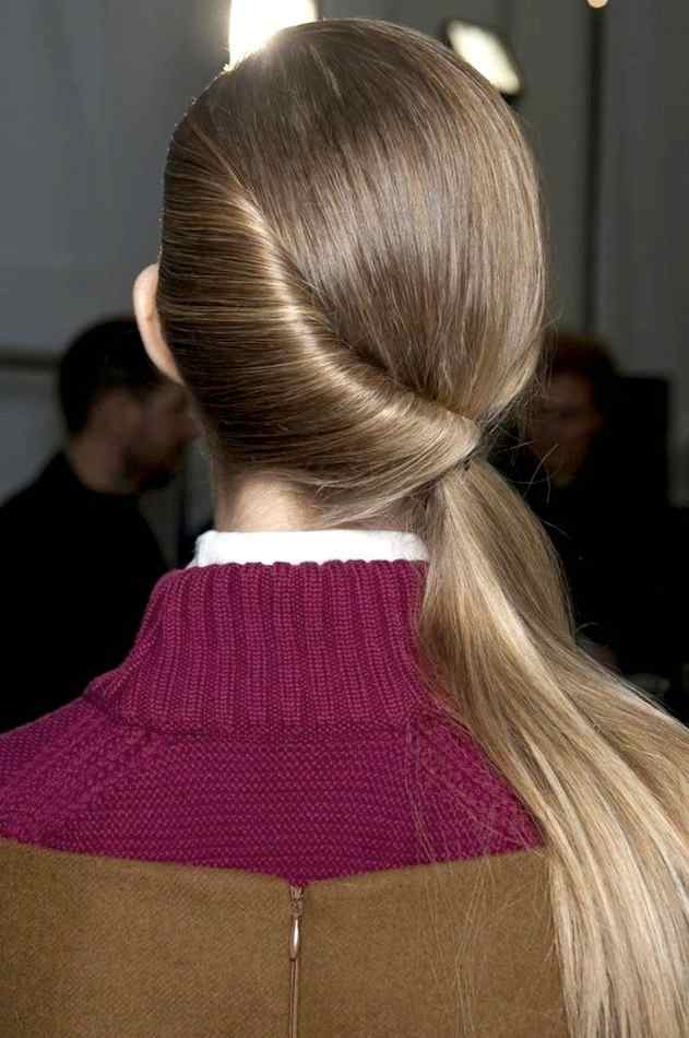 For those days when you don't want braids, a twisted side ponytail is a cute option.