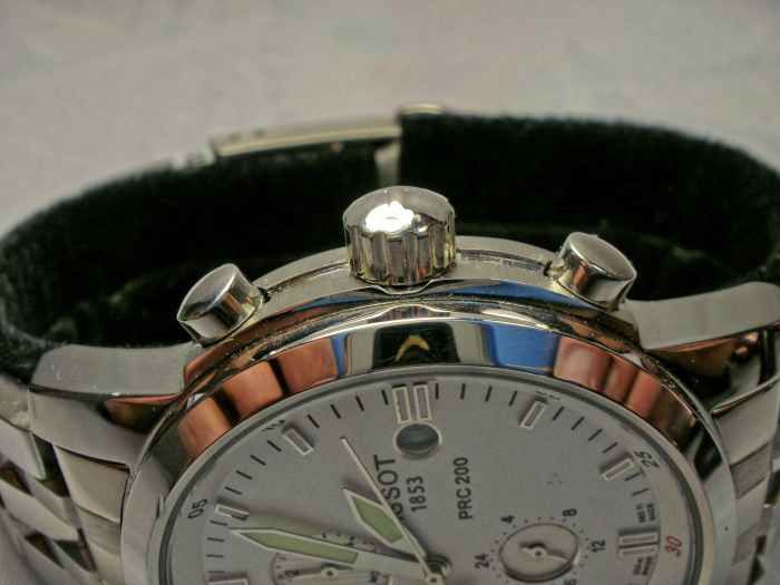 Note the tiny ding on the bezel, roughly in line with the point of the minute hand