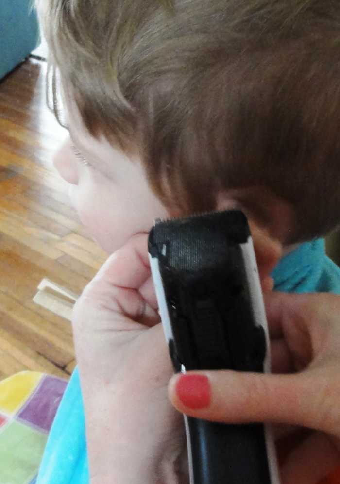 Starting with the sideburn, neaten the hair over the ears.