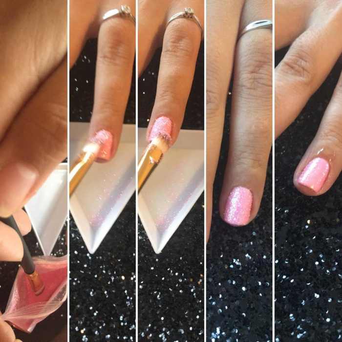 Applying glitter to a gel polish manicure.