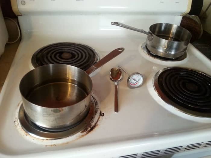 After the first seven ingredients are added to the saucepan, pour 4-6 ounces of distilled water in a second saucepan. Heat both pans to 165° F. and hold for 20 minutes.