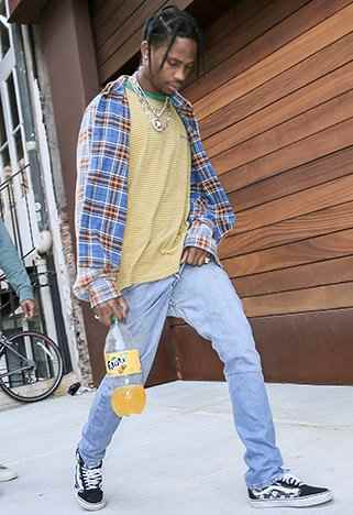Look at Travis! Light blue jeans, flannel, and a bright color pallette! A good start!