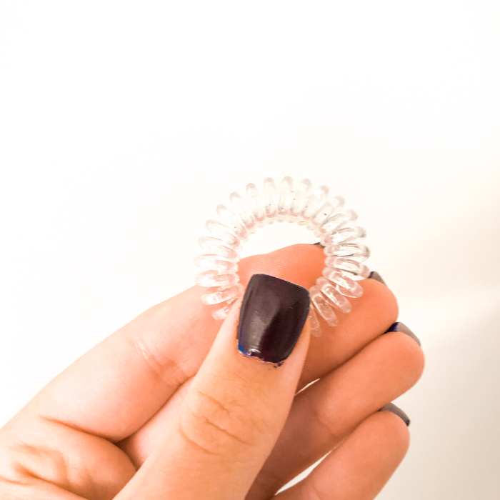 This is an Invisibobble hair tie. It will keep your hair from creasing.