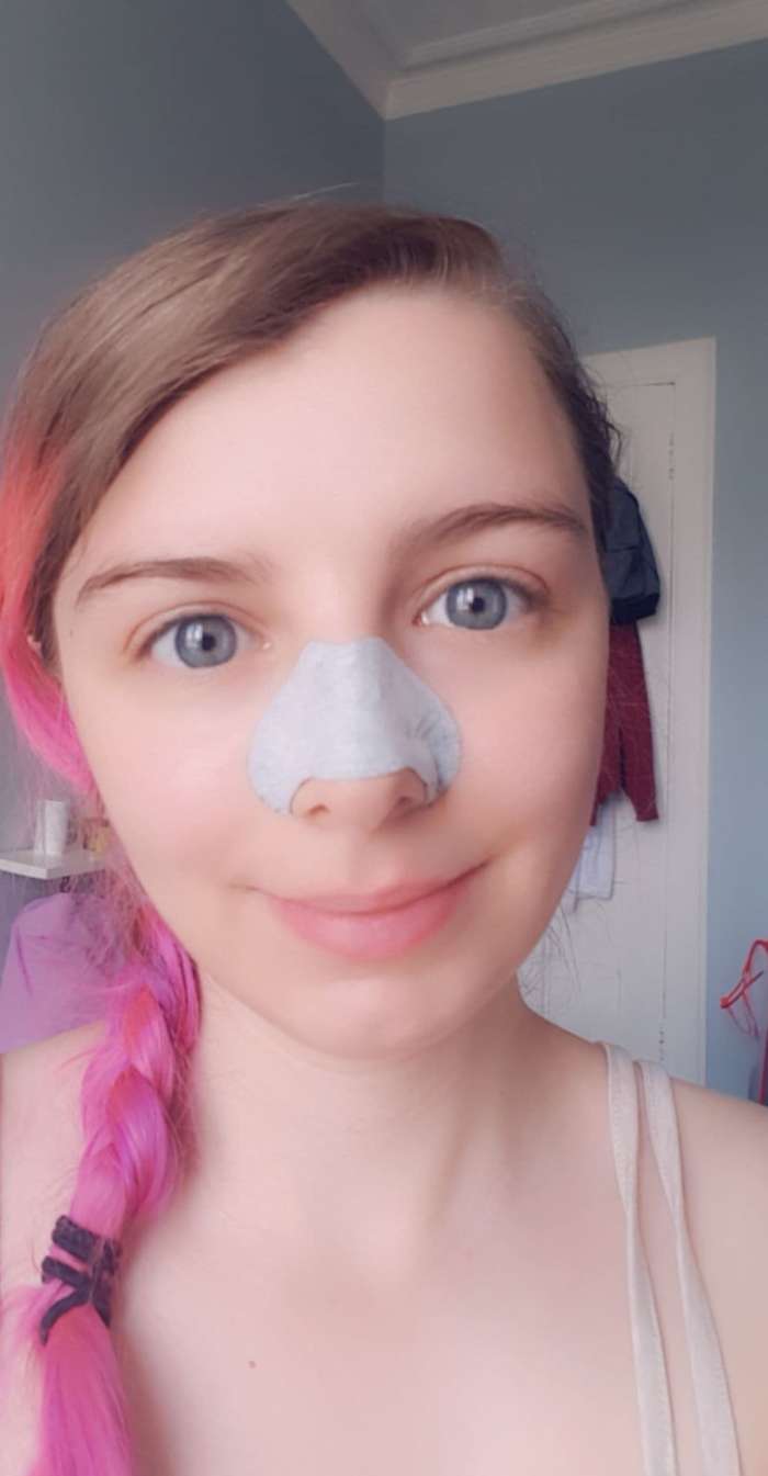 The Beauty Formulas Purifying Charcoal Cleansing Nose Pore Strip in use on my face