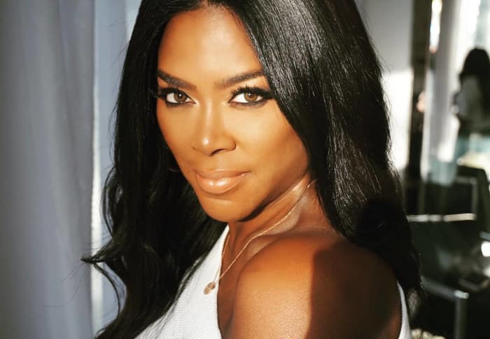 Kenya Moore is a woman of many careers: a model, actress, author, entrepreneur, and TV celebrity. Here we examine her life and career.