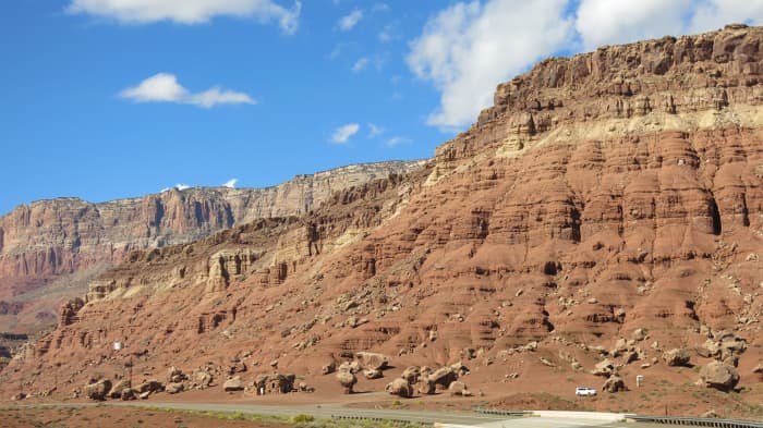 View of boulders near the highway at the foot of the Cliff Dwellers Lodge