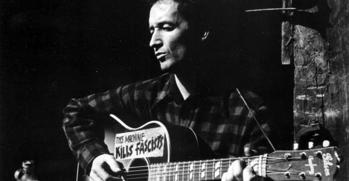 After years of hard traveling, Woody Guthrie became a household name with his lively collection of folk songs and ballads.