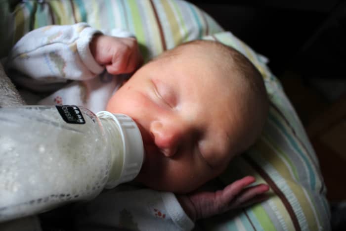 Feeding your baby while they're sleeping—known as dream feeding—could be an effective way of getting them to take the bottle.