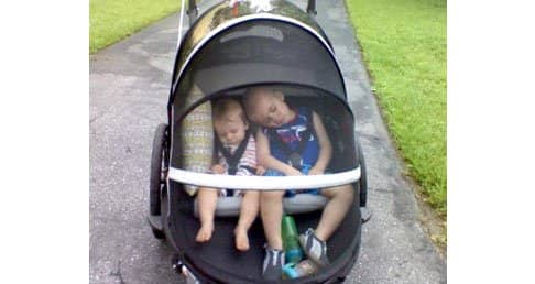 baby in bike trailer