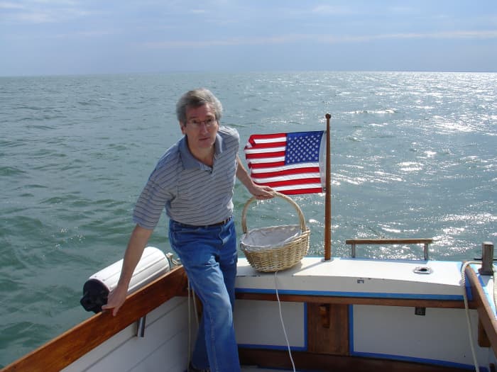 The wind and waves kicked up strong just before letting her ashes go. I had to hold on.