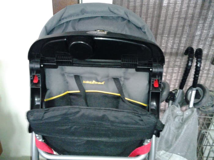 When closed, stroller stands nicely on its own and can easily be placed in a closet space.