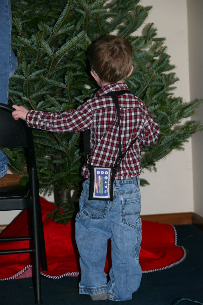 The author's son wears a pH monitoring device, to measure the amount of acid reflux in a 24 hour period. Acid reflux can contribute to eating problems in children.