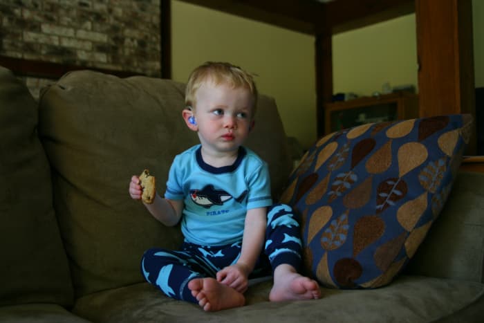 The author's son, at the age of two, would take a full day to eat a single cookie. He has reflux and delayed emptying that create feeding problems.
