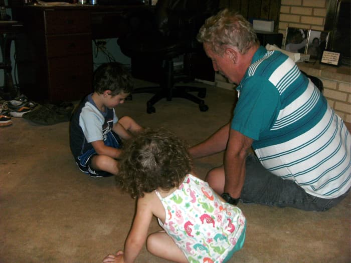 Although little sister is still rather young, Grandpa playing with cars means that she can do the same and have fun, too.