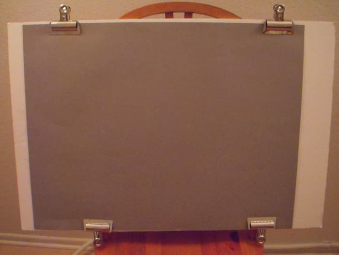 Make your own drawing board with foam core board and Bulldog clips. Lightweight and economical.