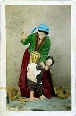 "Street Scene," Giorgio Conrad (1827-1889) People used to spank their kids in public.