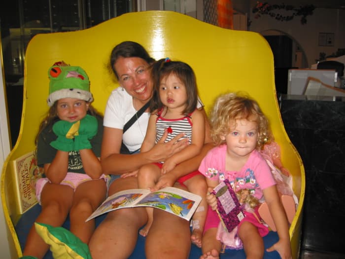 Me reading with my kids. Reading aloud every day for my kids is the best thing I did as a mom. I still read aloud to my 11 and 9 year olds!