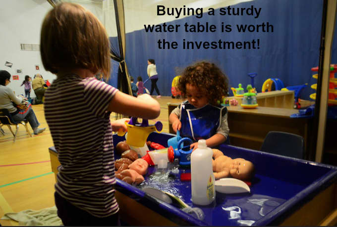 A water table can also be filled with sand, beans, or rice. Children have fun and learn about measurement while playing at a water table.