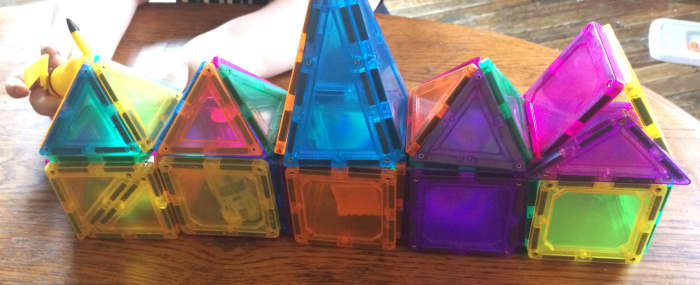 K-TILES Magnetic Building Blocks For Kids are colorful magnetic tiles that are great for learning geometric conception or as a fun and unique activity.