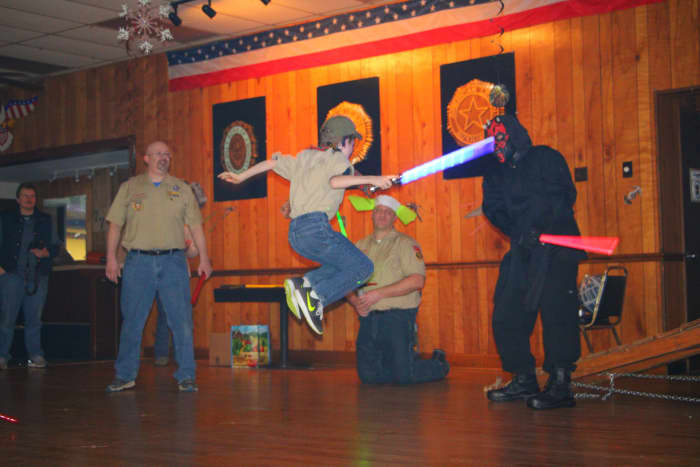Allowing the scouts to use only four moves (jump, duck, strike up, strike down) helps the Jedi training move along quickly. Darth Maul was swiftly defeated by our young scouts!