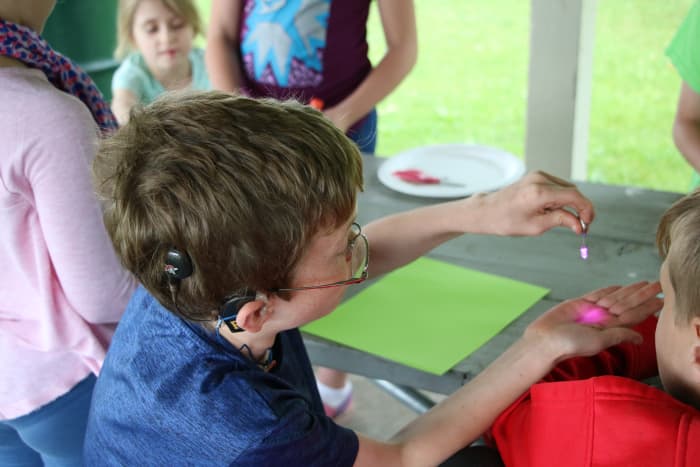 Allow children to experiment with the LEDs and batteries. They will soon discover the LED must be oriented on the battery correctly to allow the electrons to flow and for the light to shine!
