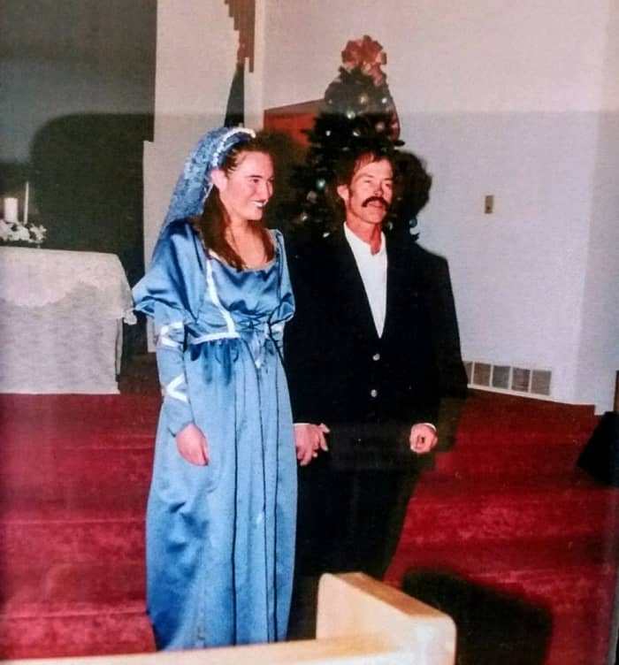 My mother and I made this gown, modifying a pattern we bought. It was an adventure, first designing the dress, finding the lavender blue satin, and stumbling across a pattern which was close to my ideal. But the memories are worth the trouble.