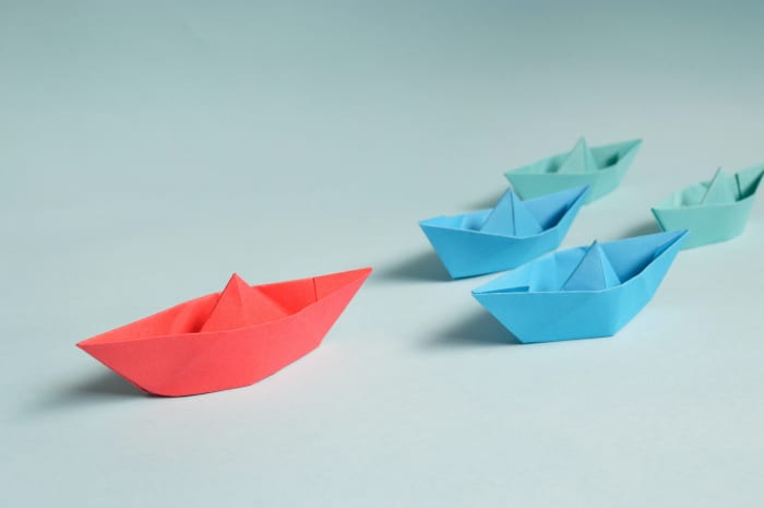 Making origami boats can be a fun activity to do with children, making creases and following directions helps a child develop their critical thinking and fine motor skills.