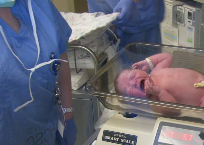 Once the baby is cleaned off, he/she is weighed and monitored for breathing or other issues.