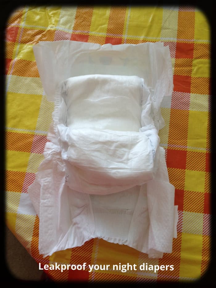 For girls or back wetters, fold a small flap down on both front and back of smaller diaper strip and place more in middle or back, as best works for you.