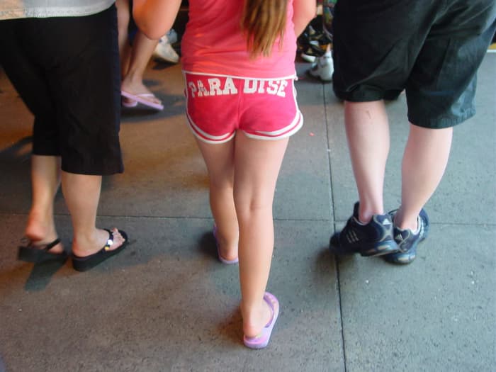 This little girl's rear reads "PARADISE." Not the best fashion choice. Should she even own this item of clothing?