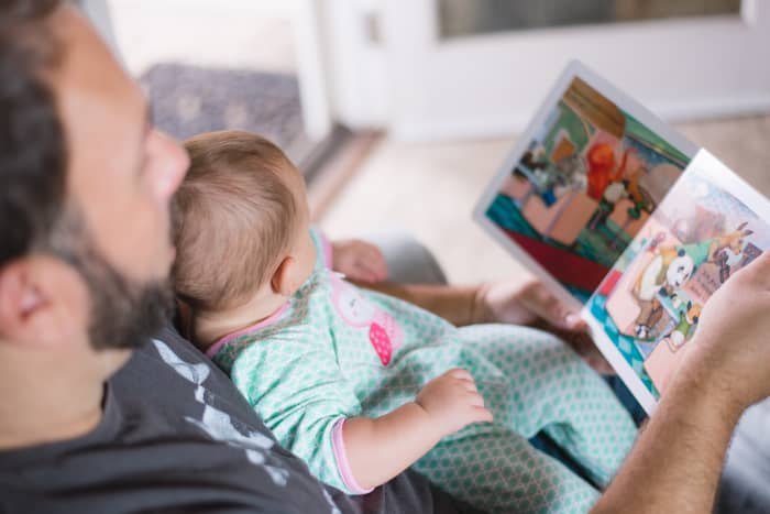 Reading with your baby before they fall asleep will help them to associate story time with sleepy time.