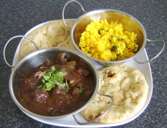 This is a mutton curry with fragrant rice. Coriander/cilantro is a very popular item used in Indian cuisines.