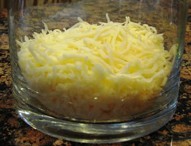 I like to use 4-cheese blend, but mozzarella is good too. Grate your own for better flavor, or use pre-grated for convenience,