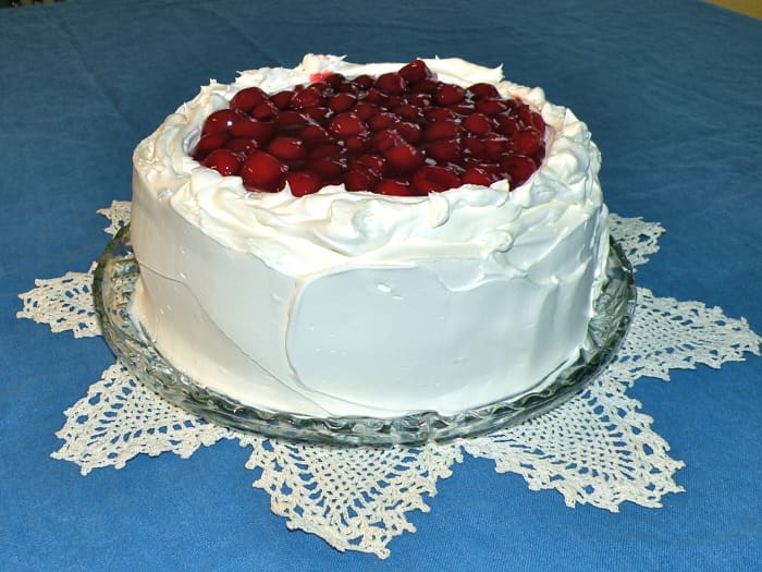 Shown is the Easy Black Forest Cake made in 9" round layers. Make the larger 9" X 13" version for a crowd.