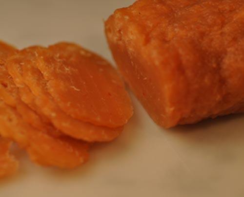 Cut rolls into thin slices.