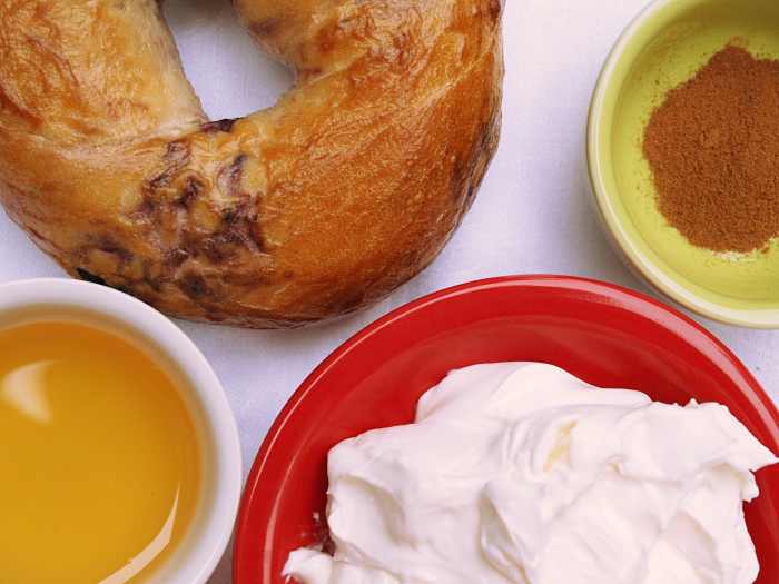 Combine honey, cinnamon, and cream cheese for a delicious topping on a toasted bagel.