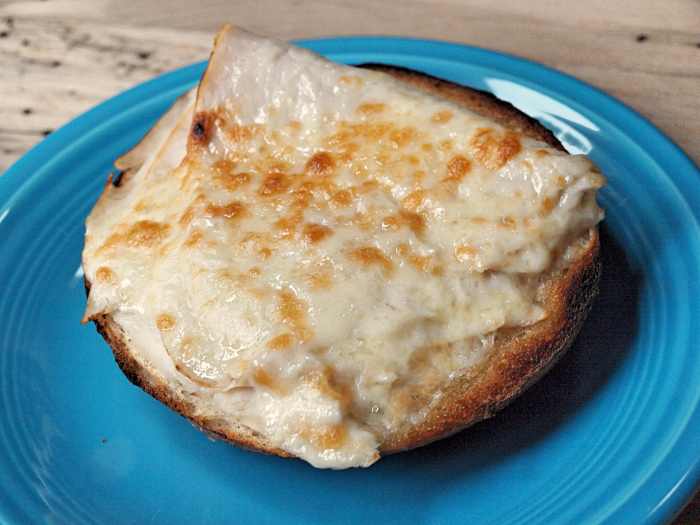 A bagel toasted with slices of turkey and cheese makes a delicious lunch, or even dinner!